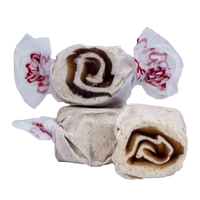 Taffy Town’s Cinnamon Roll taffy candy with a brown sugar swirl in creamy white—whipped salt water taffy with warm, bakery-inspired flavor.